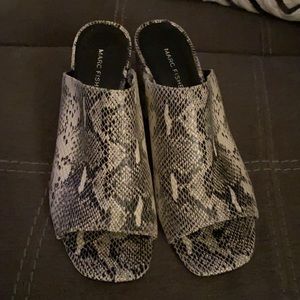 Brand new.  Beautiful and stylish!  Never worn